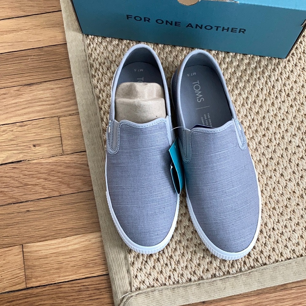 TOMS slip on gray shoes